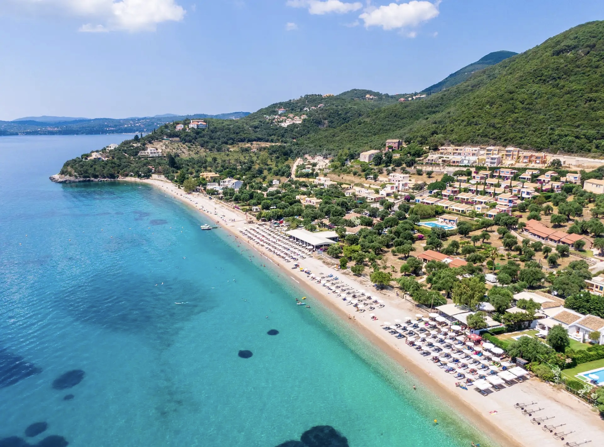 Barbati Beach is famous for its crystal-clear deep waters and stunning scenery beneath Mount Pantokrator. A favorite stop for boat trips, it’s ideal for swimming, snorkeling, and relaxing in one of Corfu’s most beautiful coastal spots.
