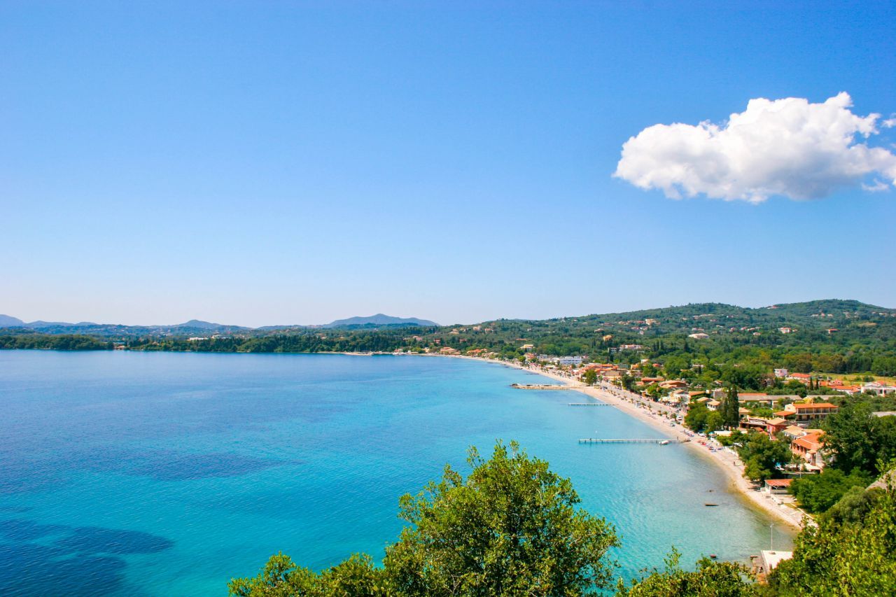 Ipsos offers a long and vibrant coastline, perfect for a refreshing swim stop during your boat trip. Its calm waters and lively seaside atmosphere make it a great place to anchor, relax, and enjoy the beauty of Corfu from the sea.